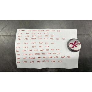 Set of 76 Lucky Lager Rebus/Puzzle Bottle Caps - Silver w/ Red Script